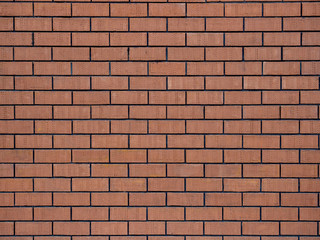 Wide red brick wall texture. background