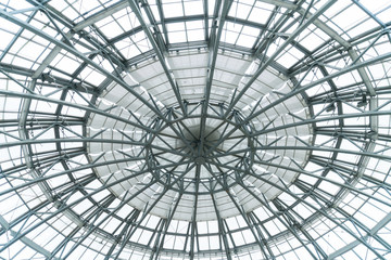 Metal construction dome building, background texture. roof inside.