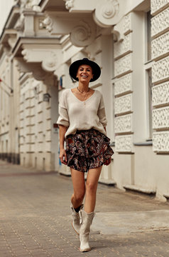 Sexy smiling woman in fashion outfit