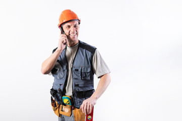 Builder talking on a cell phone.