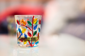 Colorful glass on a beatiful white background with bokeh