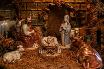 Selective Focus Closeup of an Old Fashioned China Nativity Scene in a Realistic Miniature Stable