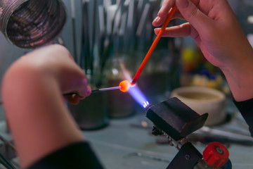hand-made lampworking in a glass-blowing workshop