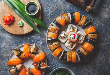 Fototapeta na wymiar Sushi and rolls sets. Japonese food. top view