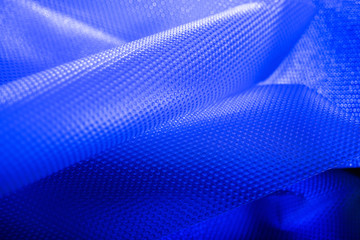 Naklejka premium Plastic in blue color. Environmental protection. Utilization of wastes.
