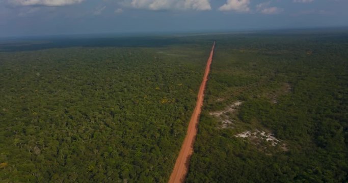 The transamazon road was built in the 70's and is a symbol of entry into the Brazilian Amazon. Today its margins are occupied and cleared for replacement by livestock. Manicor&eacute;, Amazonas, Brazil.