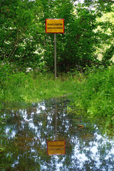 Border sign between Poland and Ukraine at Bug River. Bug river is the external border of the European Union