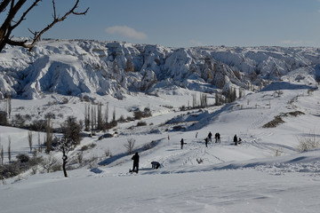 Fototapeta na wymiar winter snowy view of Cappadocia, ATV tour, rock formations