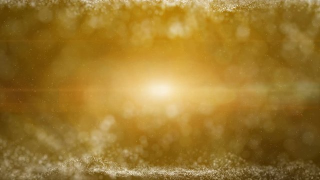 Golden glitter particles fly floating up. Glowing glittering lights on golden threads, shiny sparkling light and shimmer particles.