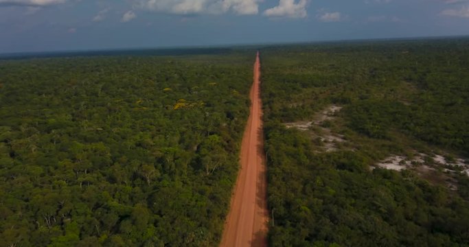 The transamazon road was built in the 70's and is a symbol of entry into the Brazilian Amazon. Today its margins are occupied and cleared for replacement by livestock. Manicor&eacute;, Amazonas, Brazil.