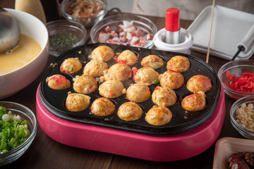 cooking home style takoyaki, japanese octopus balls