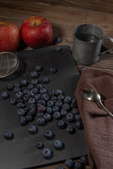 Blueberries on rustic table for healthy eating and nutrition