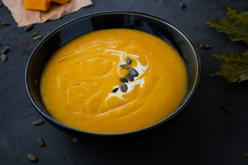 Fresh pumpkin soup with yogurt. top view. 