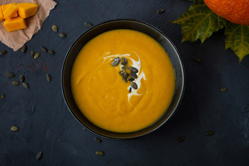Fresh pumpkin soup with yogurt. top view. 