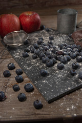 Blueberries on rustic table for healthy eating and nutrition