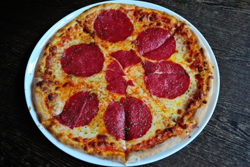Italian pizza salame piccante (salami pizza)