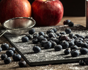 Blueberries on rustic table for healthy eating and nutrition