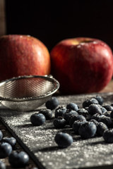 Blueberries on rustic table for healthy eating and nutrition