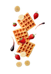 Belgium waffles with strawberries and banana - obrazy, fototapety, plakaty