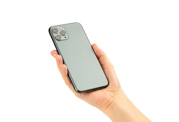 Smartphone with three cameras in hand on a white background.