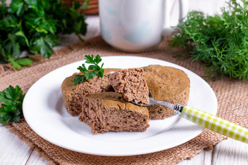 Liver souffle in a white bowl on the table
