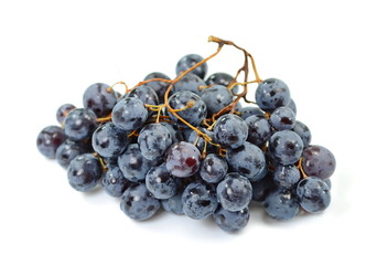 A bunch of overripe grapes isolated on white background.