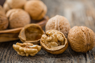 Handful of Walnuts on wooden background