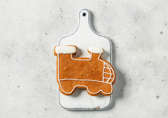 gingerbread chirstmas train on a wooden board