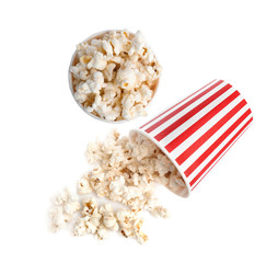 Buckets of tasty pop corn isolated on white, top view