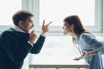 man and woman having an argument