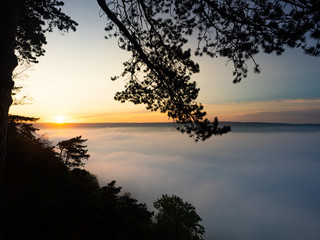Fototapeta na wymiar Morgens über den Wolken