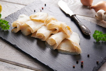 Delicious smoked halibut slices close up