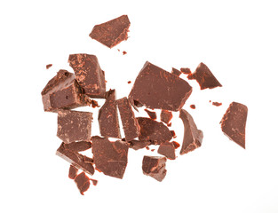 Chocolate pieces isolated on white background. Top view.