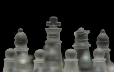 glass chess pieces close up