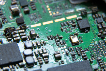 Macro photos showing tablet repair process. Tablet repair under the microscope. Mobile Board: Broken Tablet Board
