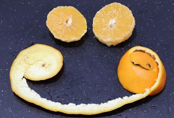slices of oranges on black background