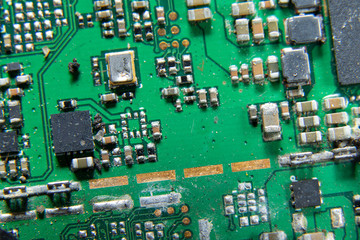 Macro photos showing tablet repair process. Tablet repair under the microscope. Mobile Board: Broken Tablet Board