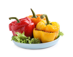 Tasty stuffed bell peppers isolated on white