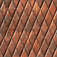 Seamless texture of a wooden surface with hand-carved imitation of leather. Volterra. Tuscany. Italy.