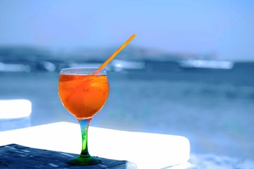 Orange drink at the beach.