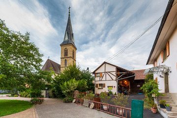 View on Eglise de Magstatt-le-Bas and timber framing house