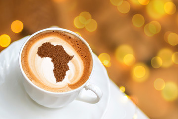 Cup of cappuccino with a picture of Africa