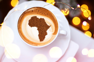 Cup of cappuccino with a picture of Africa