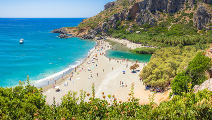 Panorama of Preveli beach at Libyan sea, river and palm forest, southern Crete , Greece © gatsi