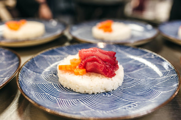 Plating ahi tuna and carrot dish