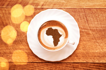 Cup of cappuccino with a picture of Africa