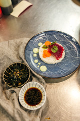 Plating ahi tuna and carrot dish