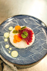 Plating ahi tuna and carrot dish