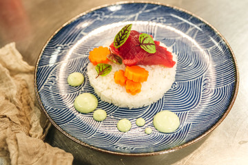 Plating ahi tuna and carrot dish