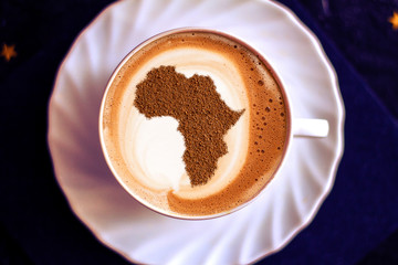 Cup of cappuccino with a picture of Africa